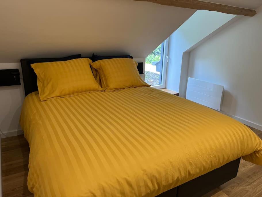 Postel nebo postele na pokoji v ubytování Joly Cottage