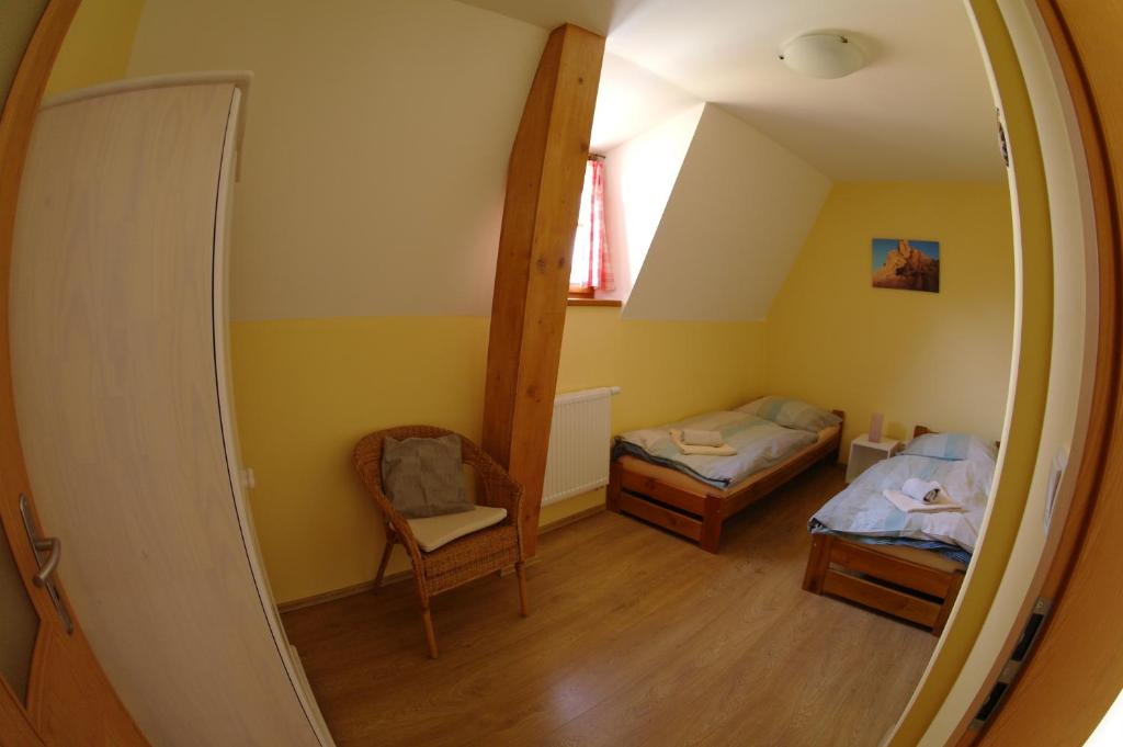 Postel nebo postele na pokoji v ubytování Penzion Hradební