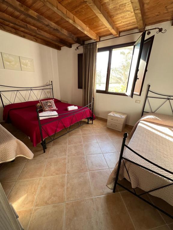 Krevet ili kreveti u jedinici u objektu Baglio Cracchiolo da Tuzzo - Villa Ulivo