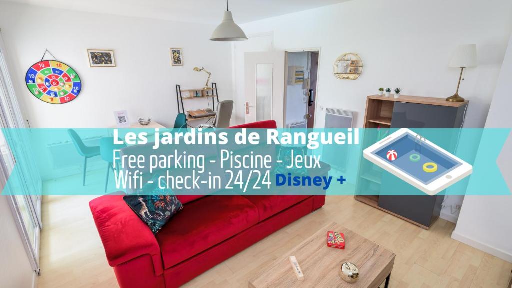 a living room with a red couch and a table at Les jardins de Rangueil, Parking, Métro, Piscine in Toulouse