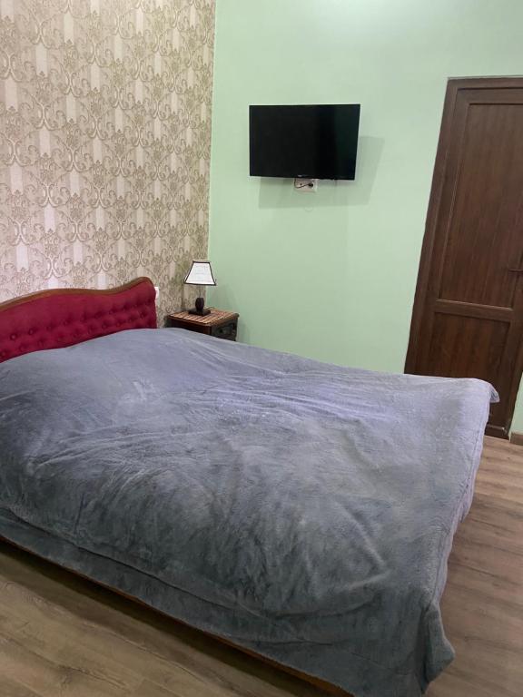 Postel nebo postele na pokoji v ubytování Guest House Ok