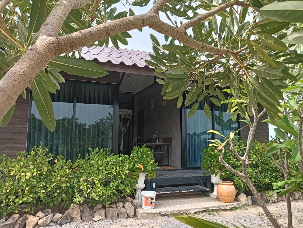 Zahrada ubytování สุขเสมอ โฮมสเตย์ (Suk-Samer homestay)