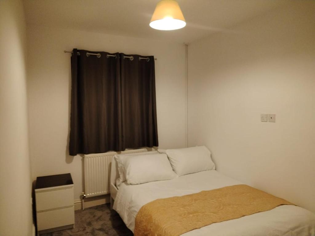 Ένα ή περισσότερα κρεβάτια σε δωμάτιο στο Thales Home FFDblBath6