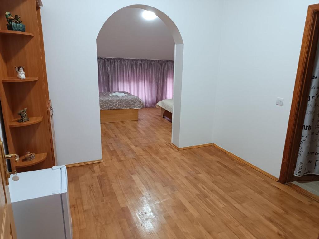 Postel nebo postele na pokoji v ubytování Hotel Daniel