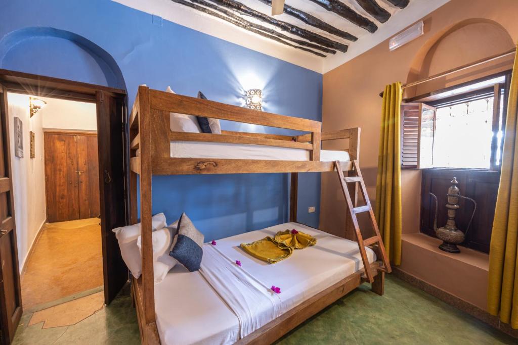 Postel nebo postele na pokoji v ubytování Shaba Boutique Hotel