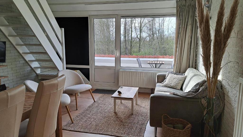 Posezení v ubytování Appartement Bru Zeeland