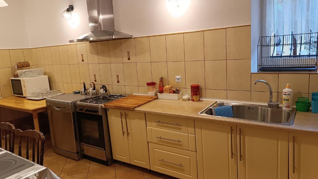 Kuchyň nebo kuchyňský kout v ubytování Agroturystyka STANICA