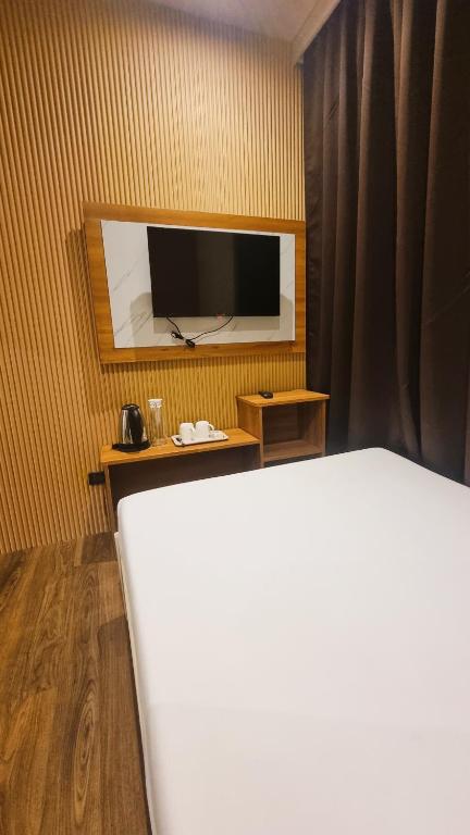 TV a/nebo společenská místnost v ubytování Eekos Bed and Breakfast