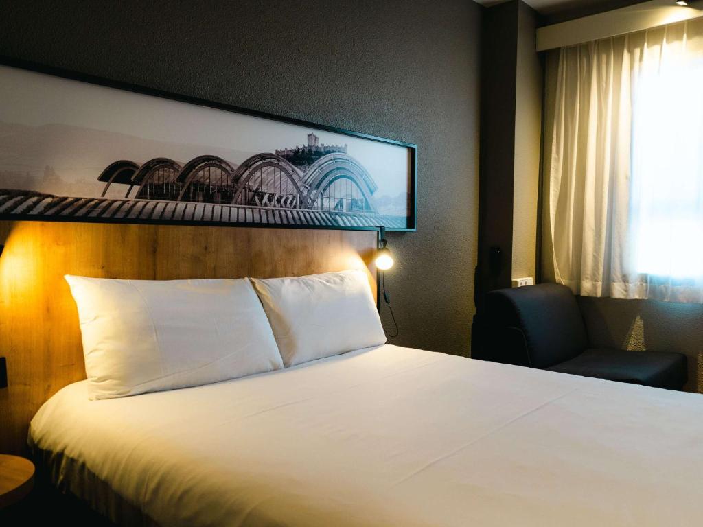 Postel nebo postele na pokoji v ubytování Ibis Valladolid
