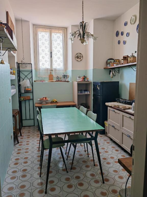 A kitchen or kitchenette at B&B LaMaGia di Corte Moronati