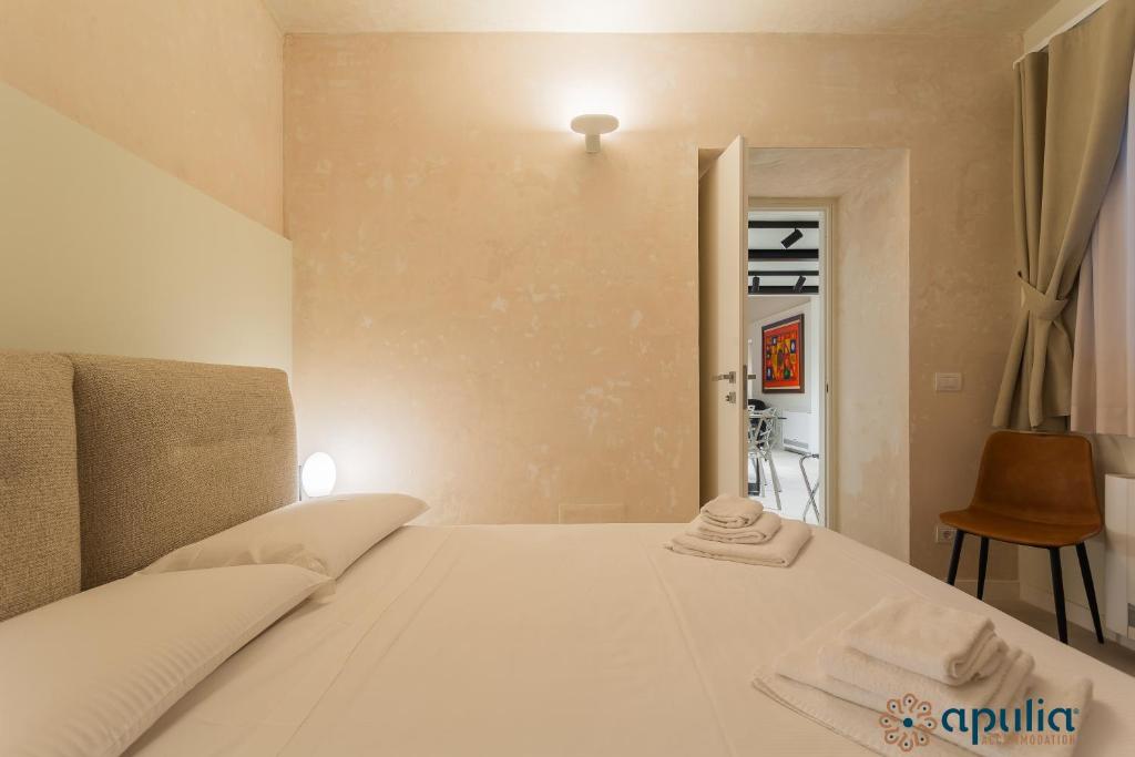 Posteľ alebo postele v izbe v ubytovaní Zema Home by Apulia Accommodation