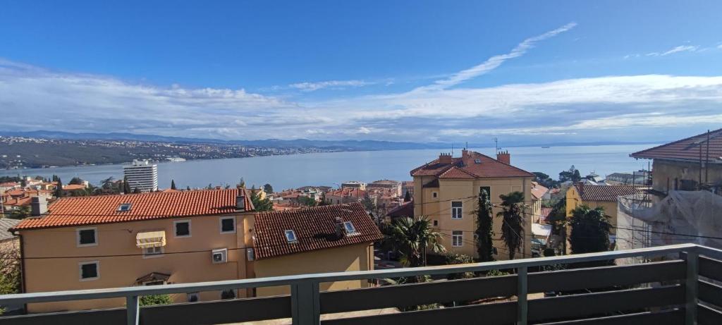 a view of the water from a city at Ellena Sunshine in Opatija