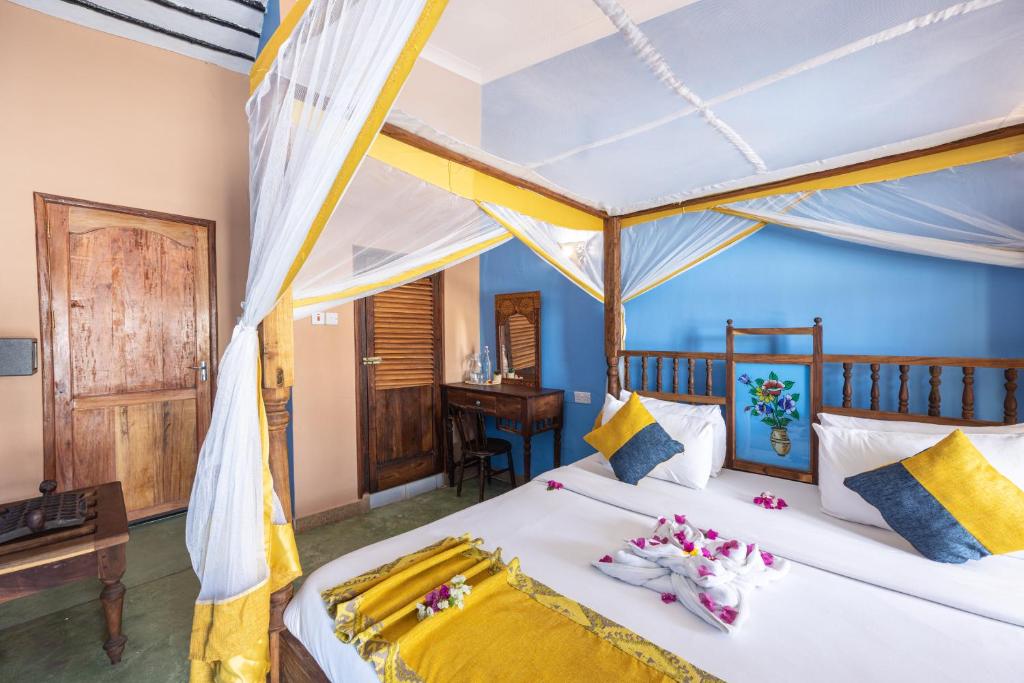 Postel nebo postele na pokoji v ubytování Shaba Boutique Hotel
