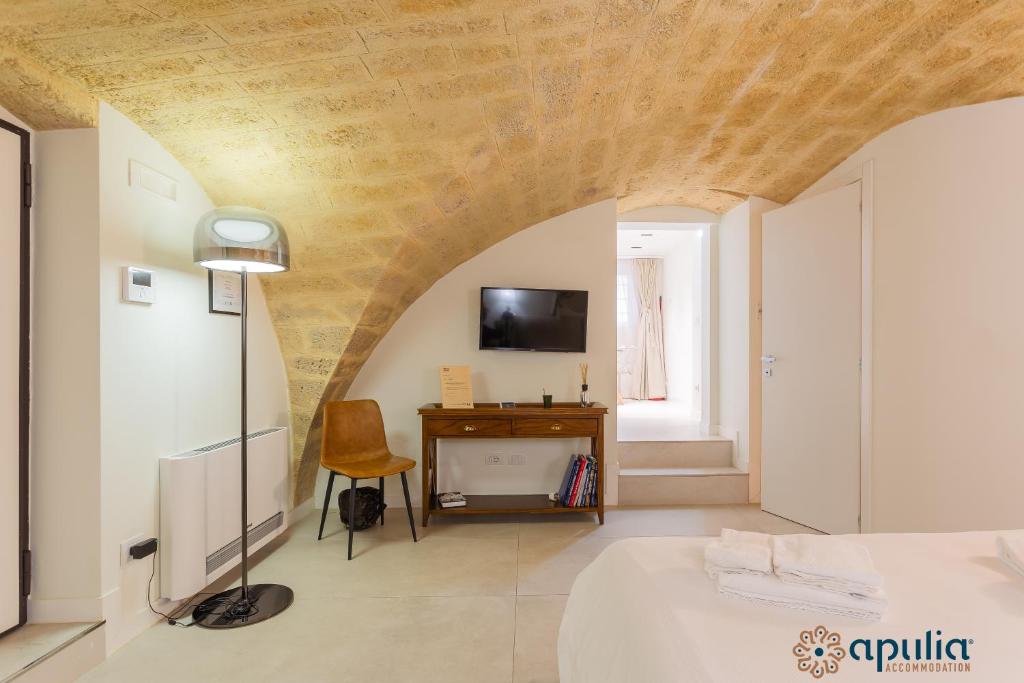 Televízia a/alebo spoločenská miestnosť v ubytovaní Zema Home by Apulia Accommodation