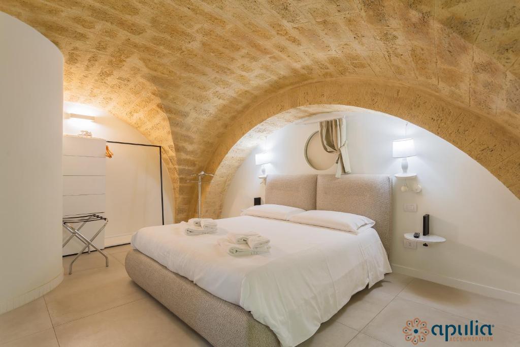 Posteľ alebo postele v izbe v ubytovaní Zema Home by Apulia Accommodation