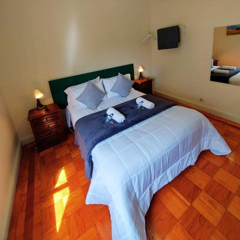 Postel nebo postele na pokoji v ubytování Imaculada Home Royal - Centro de Braga, Historico