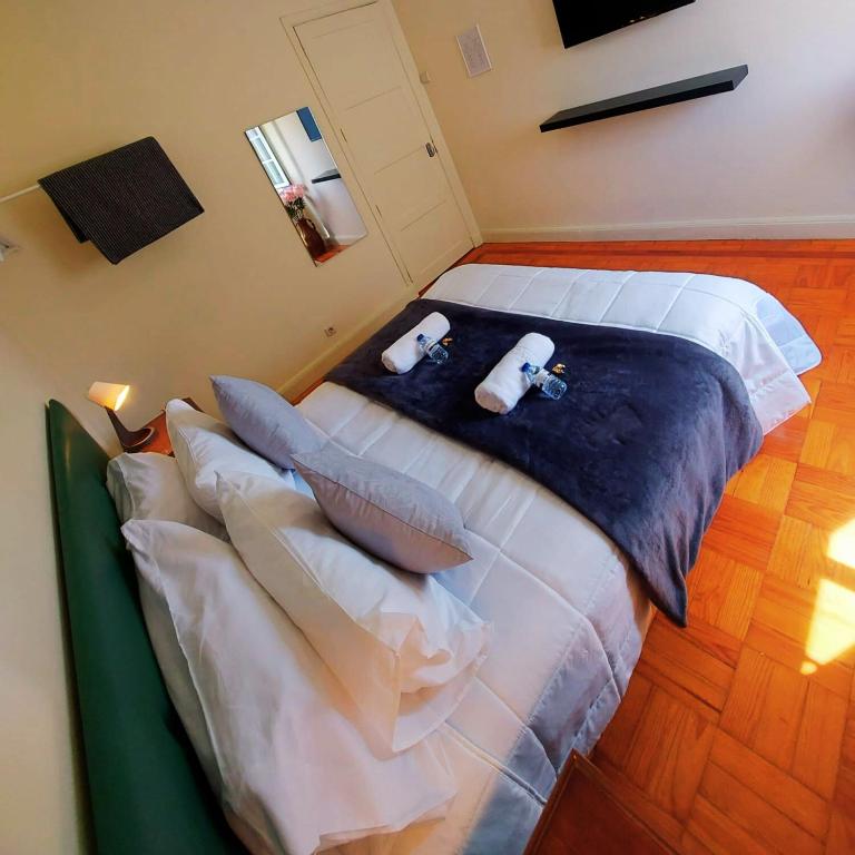 Postel nebo postele na pokoji v ubytování Imaculada Home Royal - Centro de Braga, Historico