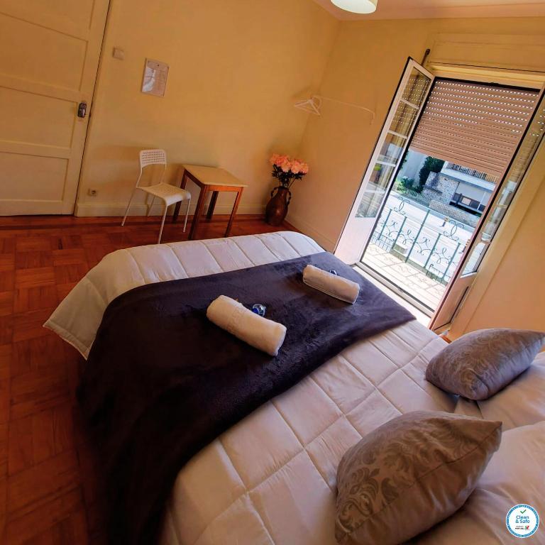Postel nebo postele na pokoji v ubytování Imaculada Home Royal - Centro de Braga, Historico