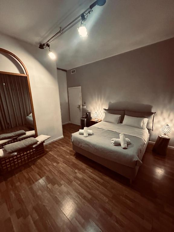 Postel nebo postele na pokoji v ubytování B&B Degli Artisti Suite