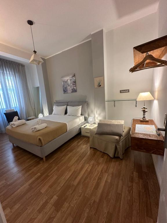 Postel nebo postele na pokoji v ubytování B&B Degli Artisti Suite