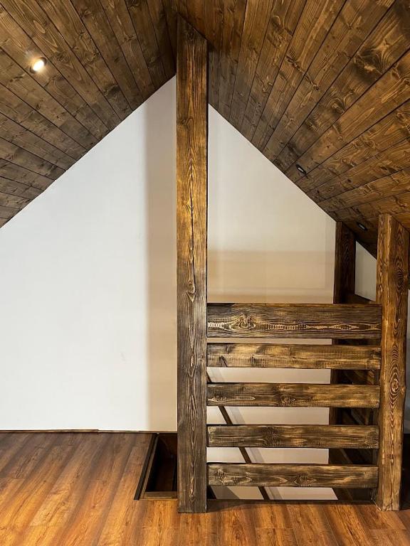 Palanda nebo palandy na pokoji v ubytování Apartmány Vlachovice