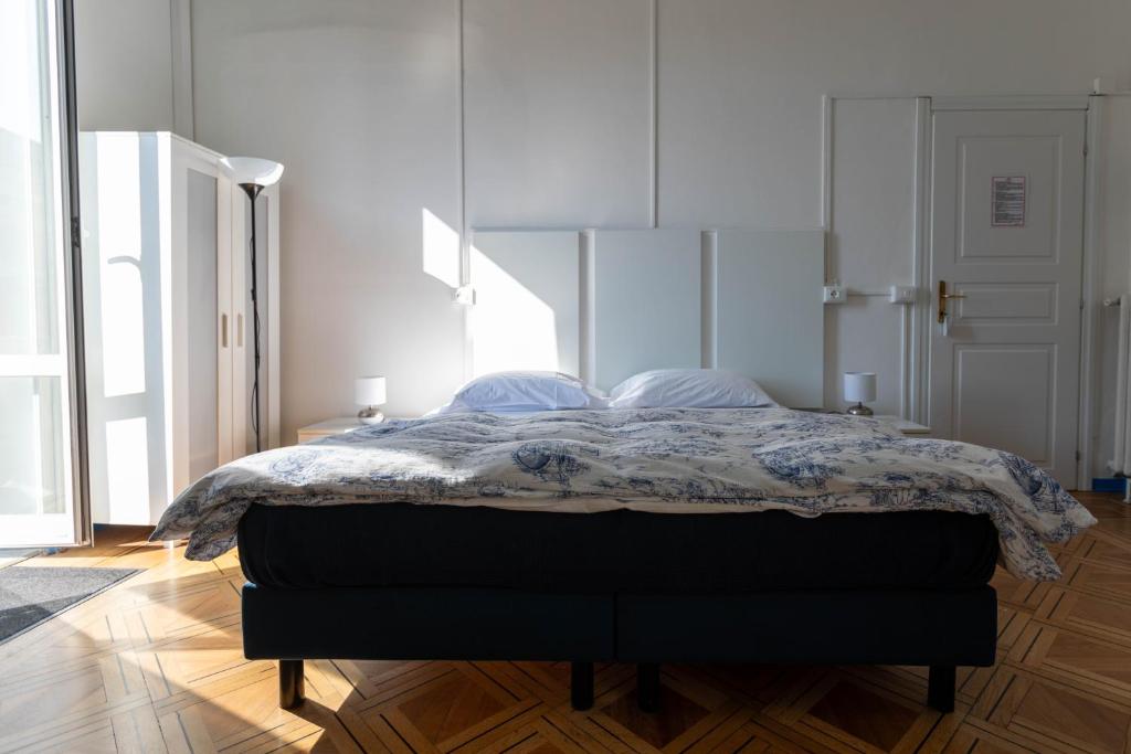 Postel nebo postele na pokoji v ubytování Olympia Hotel