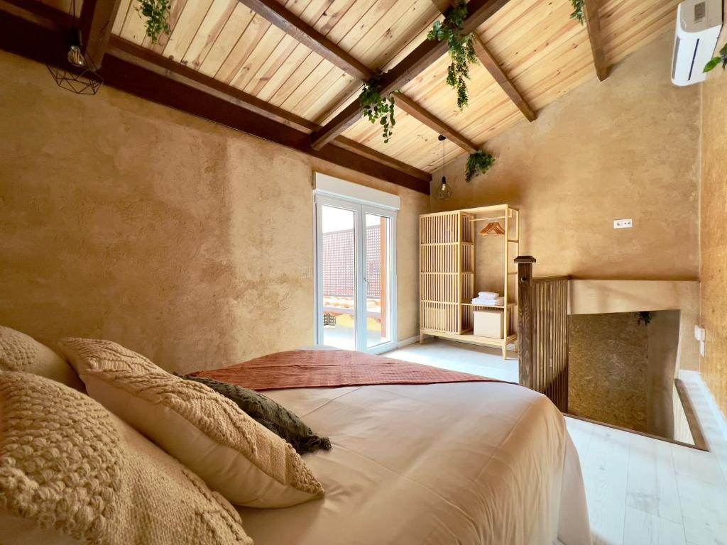 Postel nebo postele na pokoji v ubytování Apartamentos Turísticos Juego de Cañas