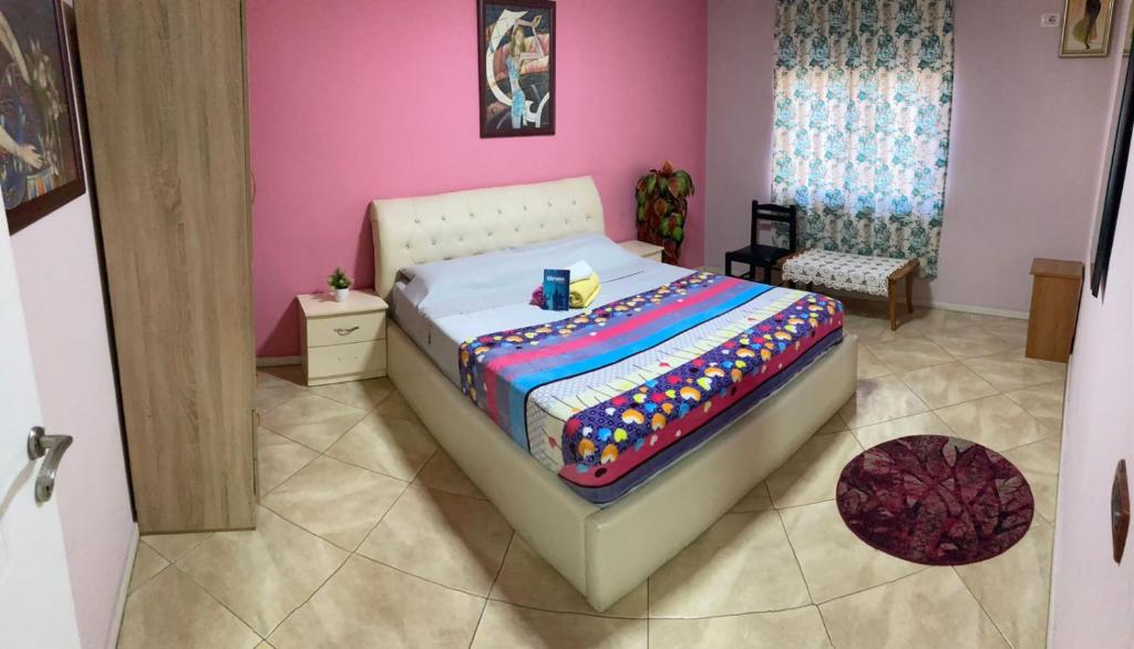 Postel nebo postele na pokoji v ubytování NEO Apartments