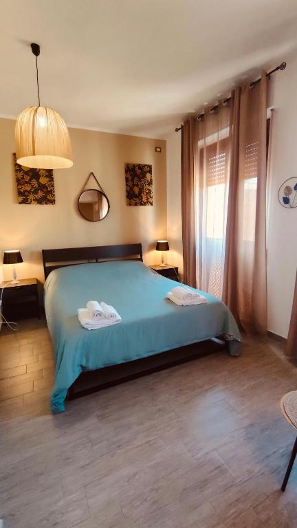 Postel nebo postele na pokoji v ubytování B&B Libellula