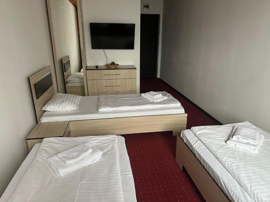 Postel nebo postele na pokoji v ubytování Pipash