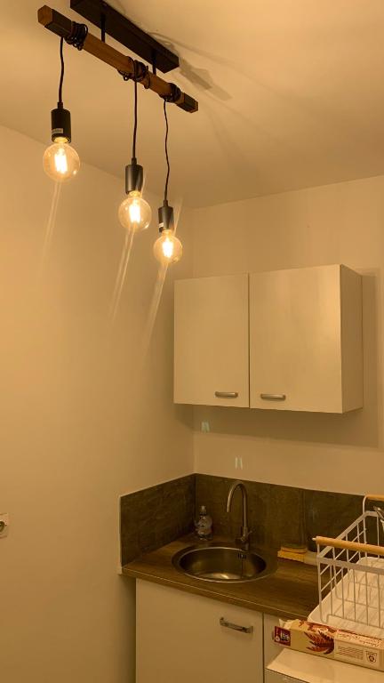 Kuchyň nebo kuchyňský kout v ubytování Appartement Ciel et Mer