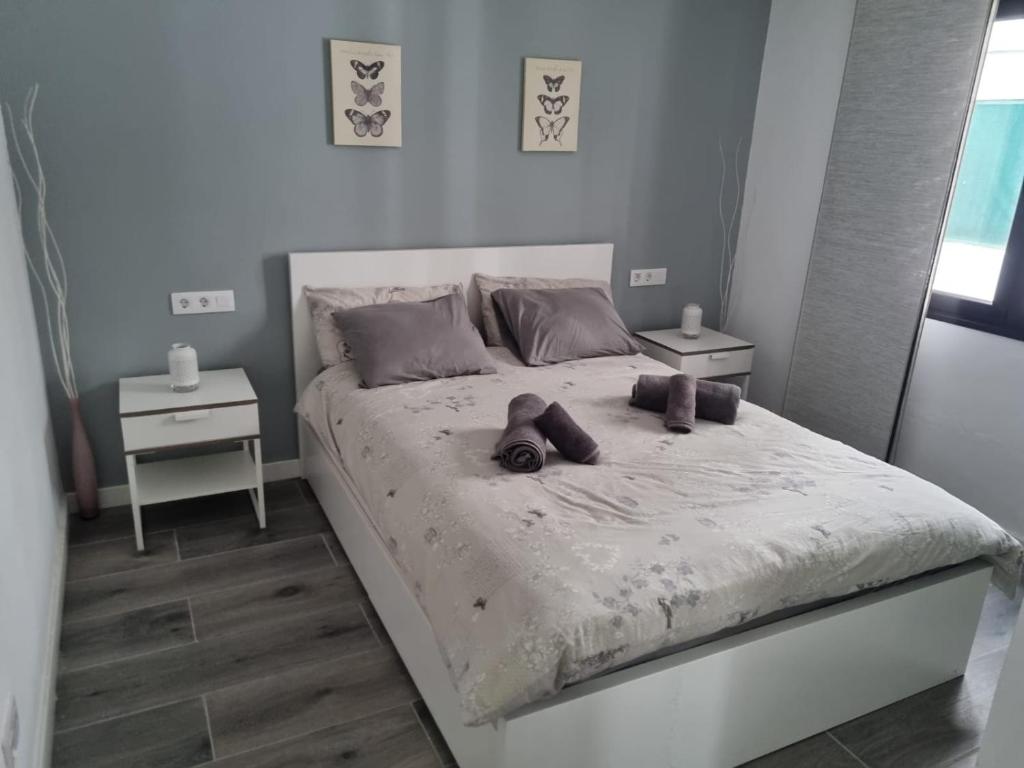 Ένα ή περισσότερα κρεβάτια σε δωμάτιο στο CASA KARLOS
