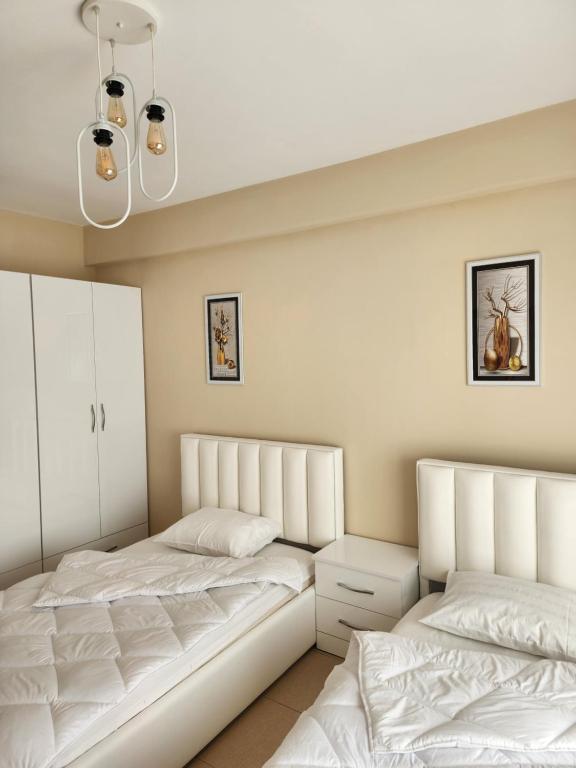 Voodi või voodid majutusasutuse Marvellous Apartment at EXALCO toas