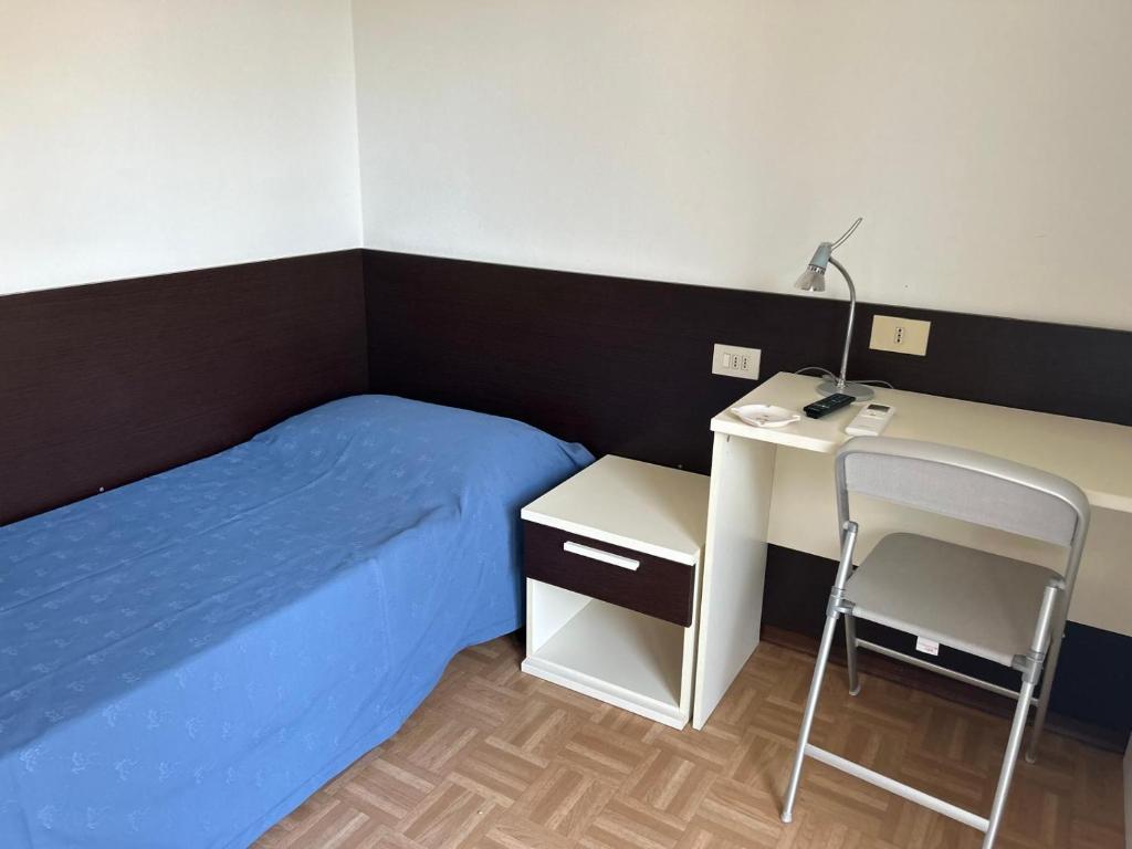 Postel nebo postele na pokoji v ubytování Hotel Aspe