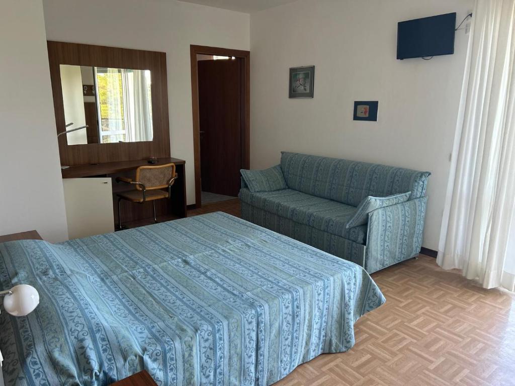 Postel nebo postele na pokoji v ubytování Hotel Aspe