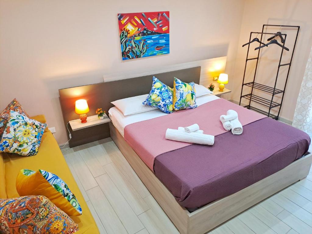 Postel nebo postele na pokoji v ubytování Casa Mizzica Palermo