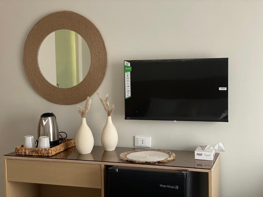 TV a/nebo společenská místnost v ubytování Diyar Pyramids Inn