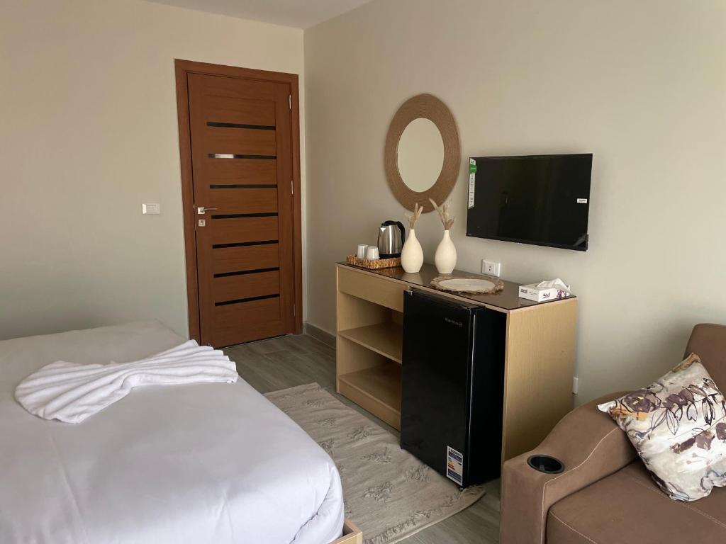 Postel nebo postele na pokoji v ubytování Diyar Pyramids Inn
