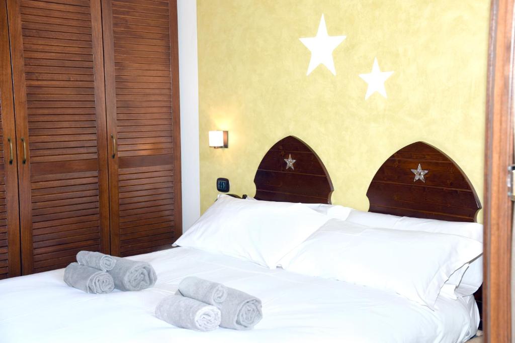 Postel nebo postele na pokoji v ubytování Agriturismo La Pecora Nera