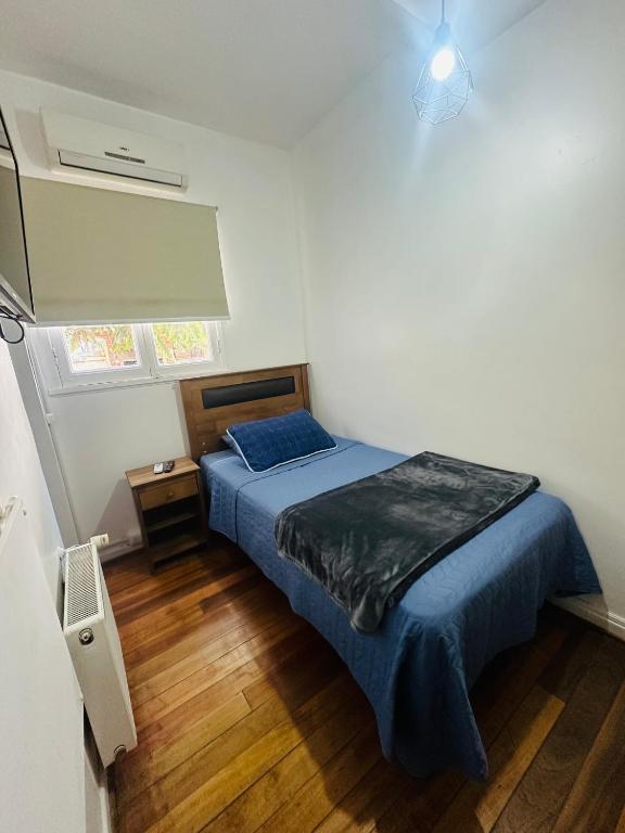 Postel nebo postele na pokoji v ubytování MAKTVB Europa - Hostal Boutique