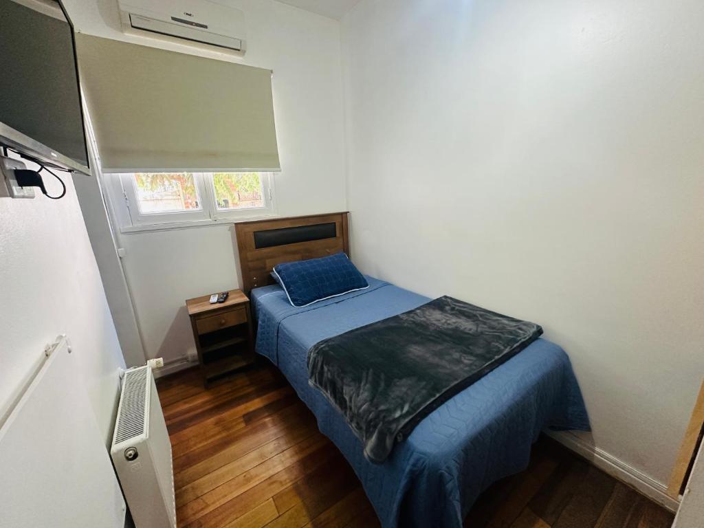 Postel nebo postele na pokoji v ubytování MAKTVB Europa - Hostal Boutique