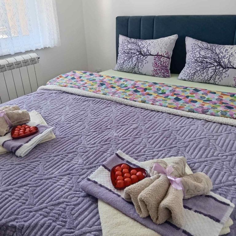 Postel nebo postele na pokoji v ubytování Apartman LARA