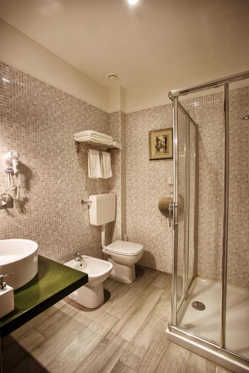 Koupelna v ubytování Igiban Hotel