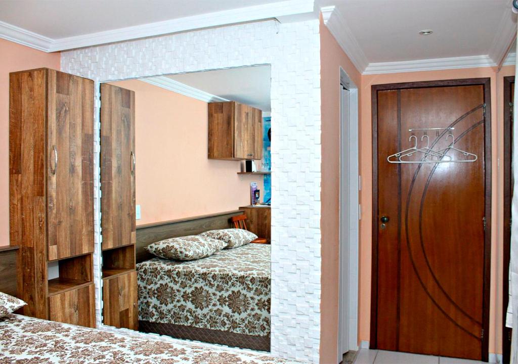 Postel nebo postele na pokoji v ubytování Pousada Amigos do Caetés