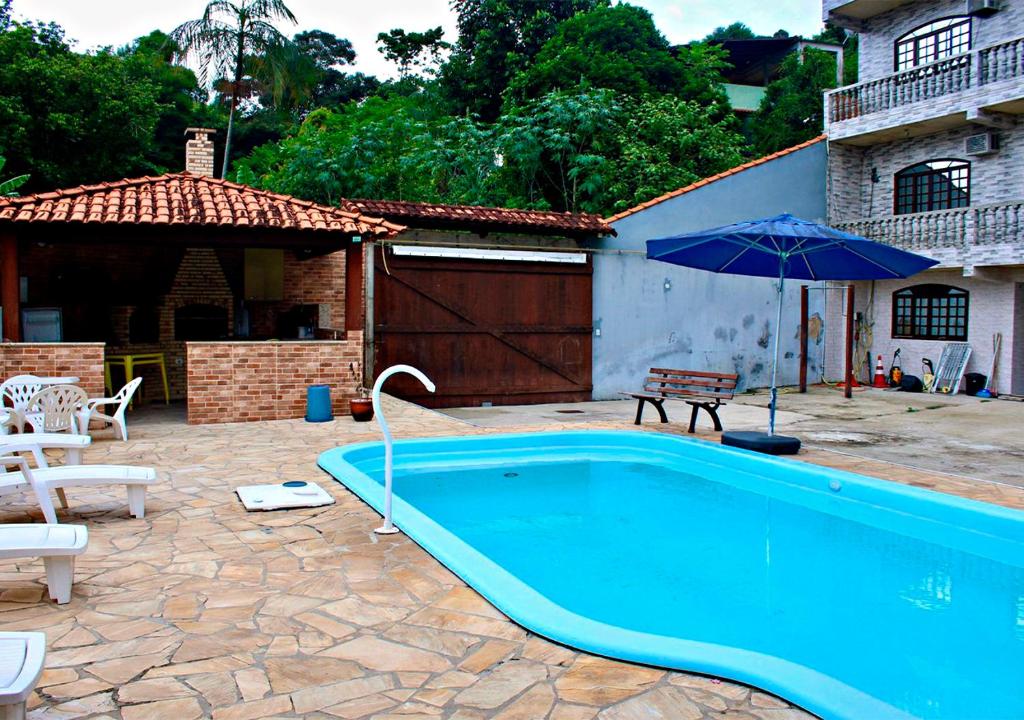 Bazén v ubytování Pousada Amigos do Caetés nebo v jeho okolí