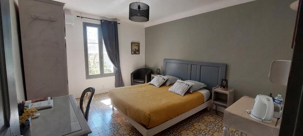 Postel nebo postele na pokoji v ubytování Bastide Sainte Agnès