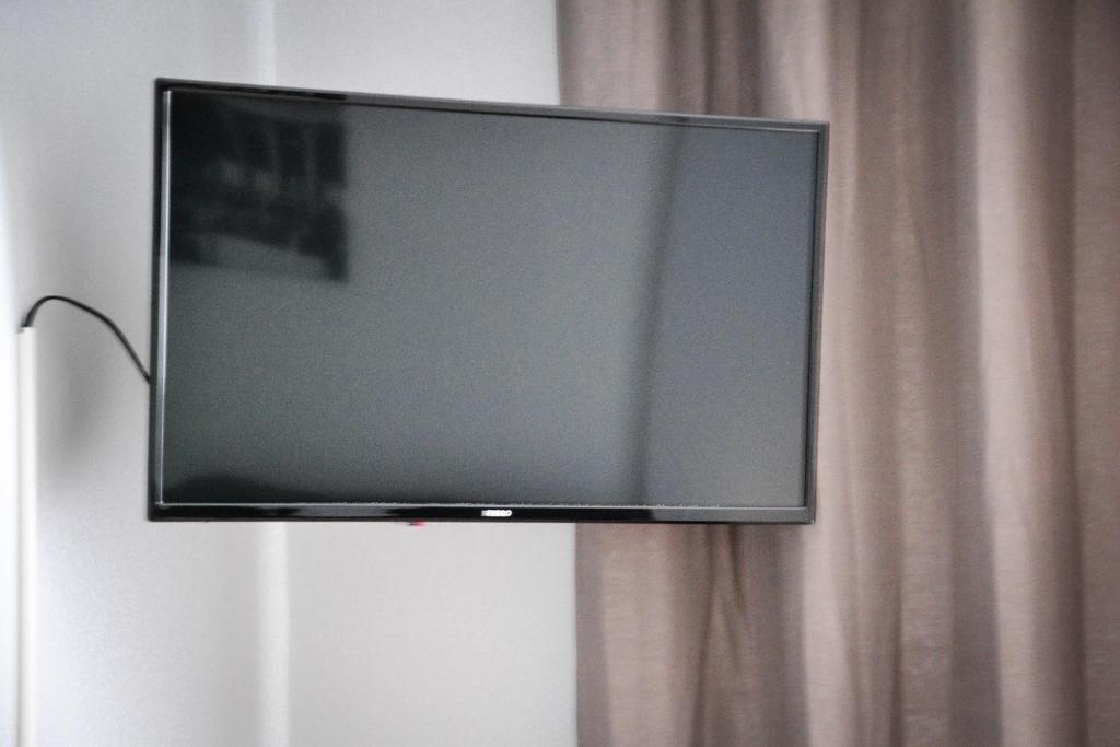 TV a/nebo společenská místnost v ubytování Horizont Apart-Hotel