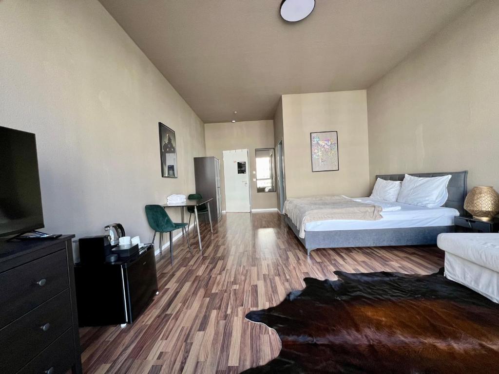 Postel nebo postele na pokoji v ubytování N8 ROOMS - by Leipzig Suites