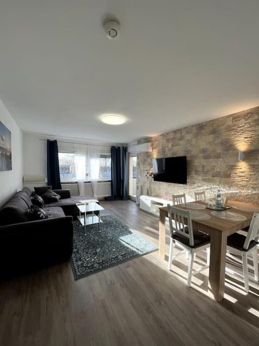 TV/trung tâm giải trí tại Familienwohnung nähe Europapark, Messe, Gifiz See