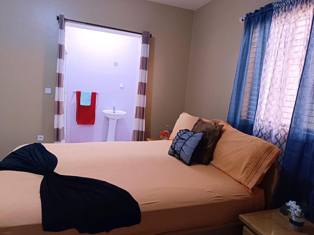 Postel nebo postele na pokoji v ubytování Pensão Dona Fica